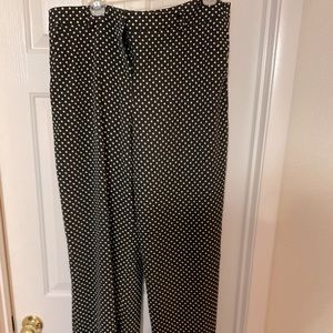 Black trousers with white polka dots